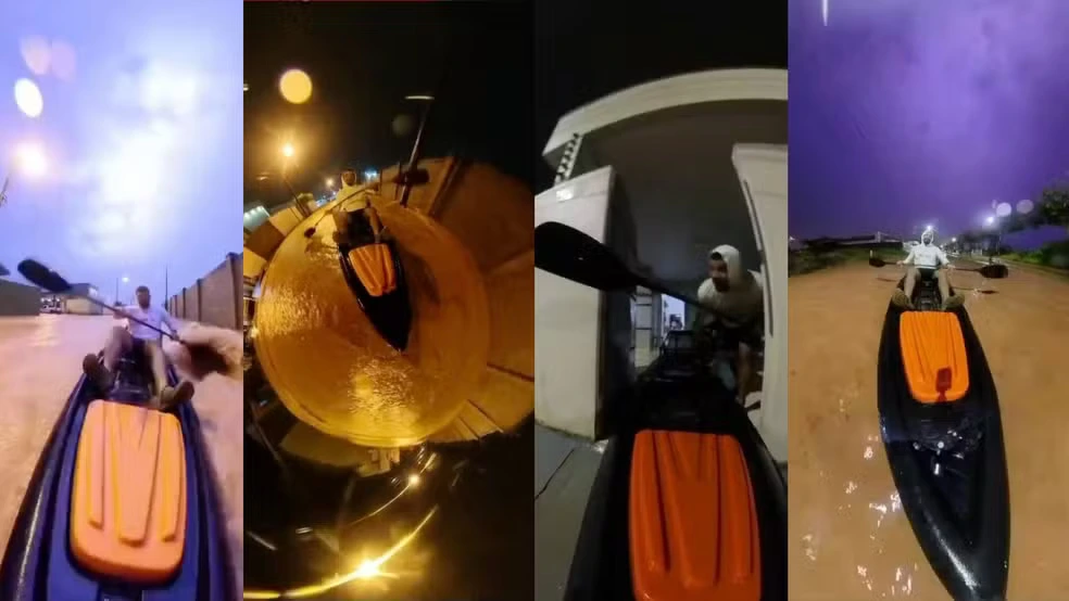 Morador navega de caiaque em ruas alagadas após chuva em Vilhena